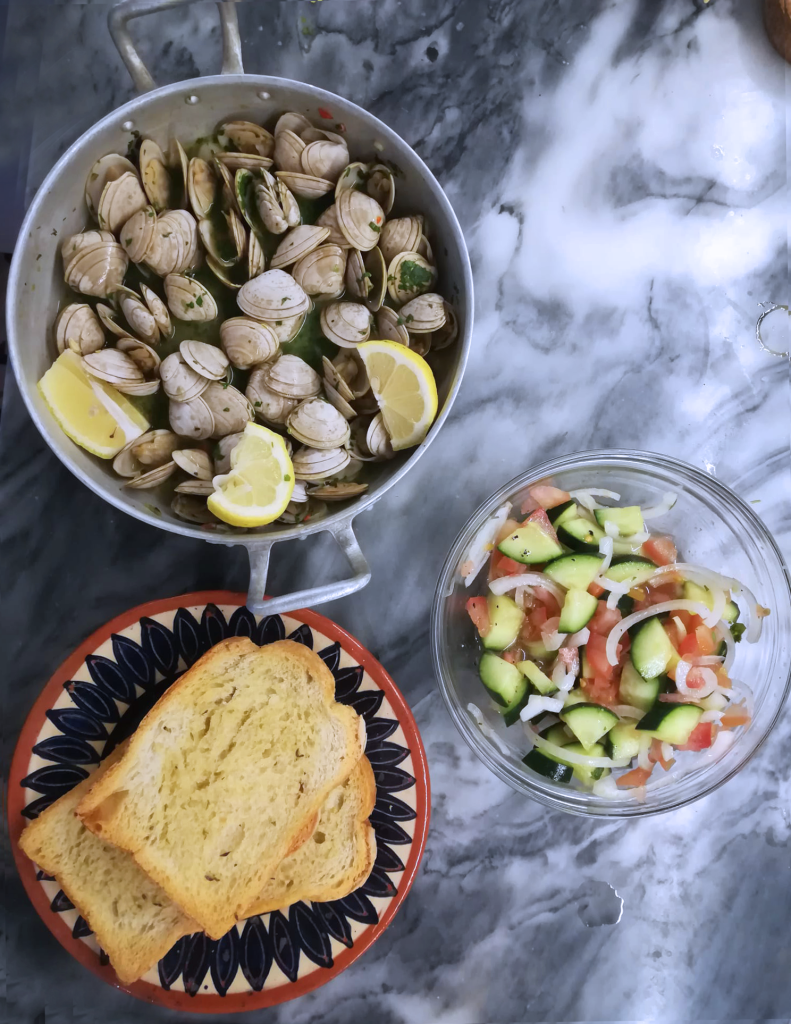 Portuguese clams, salad and toasted bread